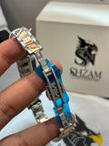 True Worth Ladies Quartz Watch butterfly deployment clasp detail held in hand with Shzam box in background