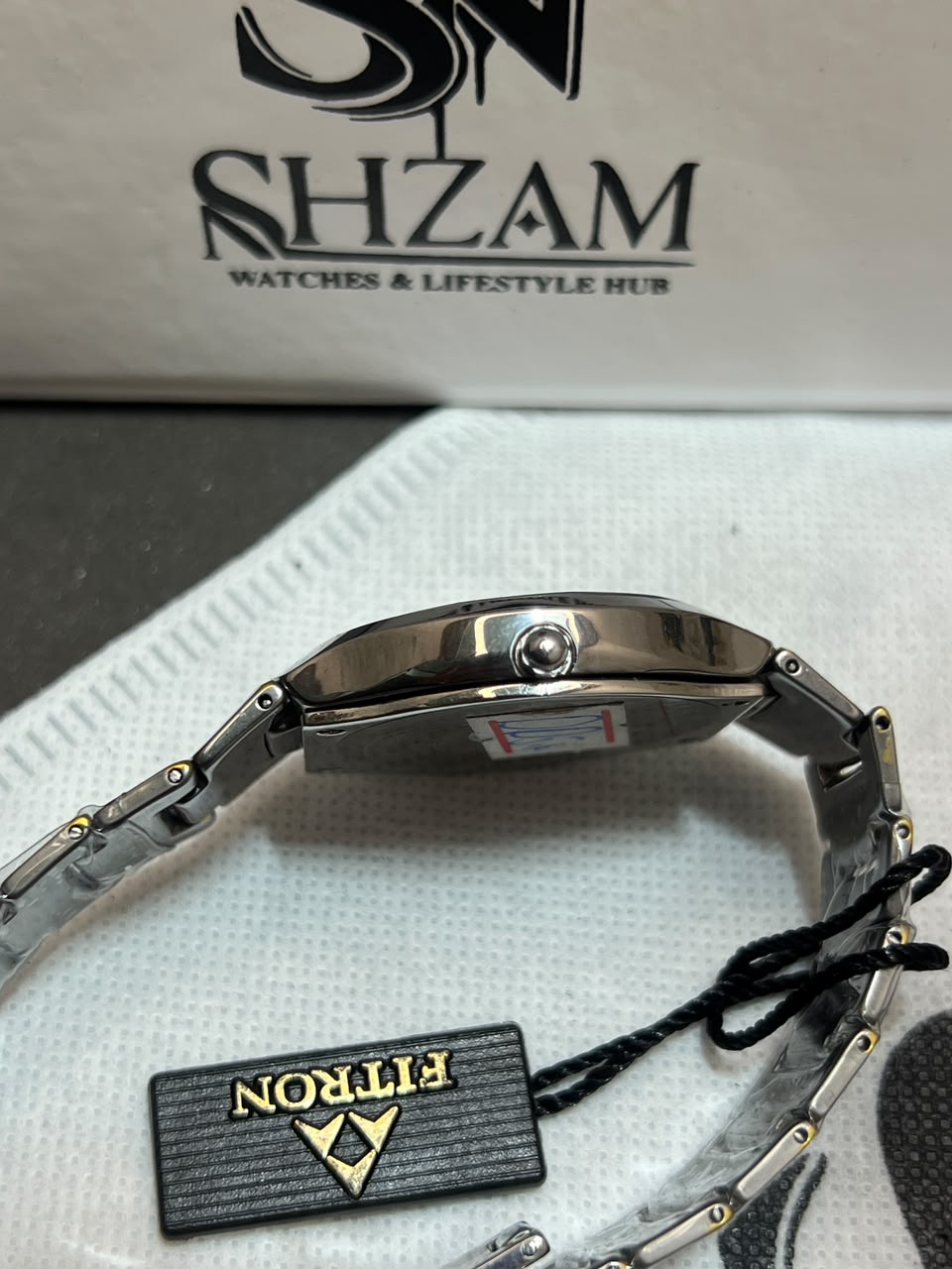 Fitron Sapphire – Side Profile with Crown & Shzam Box Background