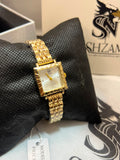 True Worth Gold Square Ladies Watch - Full Gold Front View on Pillow