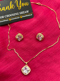 Pink Square Crystal Halo Necklace and Earrings Set on red fabric