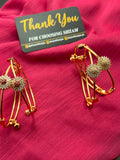 Gold Crystal Flower Cuff Bangle Pair close-up showing Ruby Red and White crystal flower centers