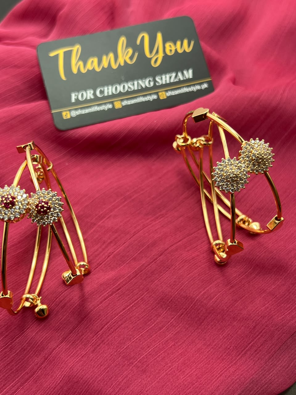 Gold Crystal Flower Cuff Bangle Pair close-up showing Ruby Red and White crystal flower centers