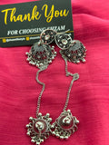 Oxidized Silver Jhumka Earrings with Chain and Tikka close-up showing dome and sunburst tikka detail