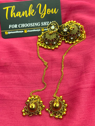 Antique Gold Jhumka Earrings with Chain and Tikka close-up showing dome and sunburst tikka detail