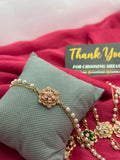 Black Crystal Flower Pearl Bracelet on pillow with Shzam thank you card