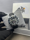 Silver Diver Watch - Front Dial View Held in Gloved Hand Shzam Box Background