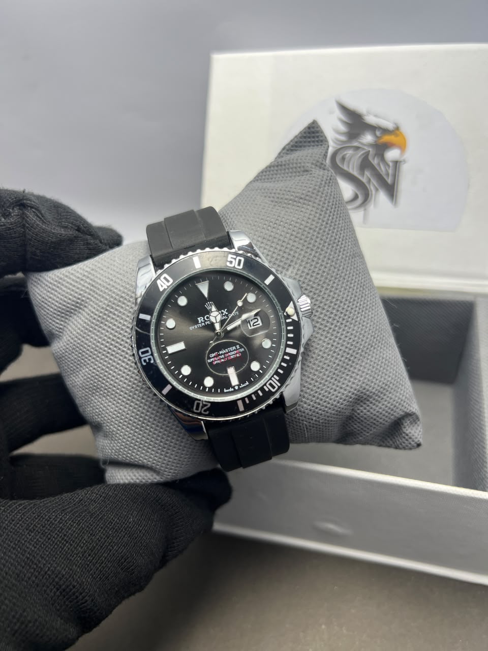 Silver Diver Watch - Front Dial View Held in Gloved Hand Shzam Box Background